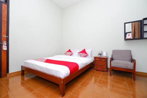 Imagen de la habitación del Hotel OYO 1414 Paviliun Permata. Foto 19