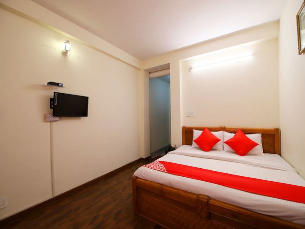 Imagen de la habitación del Hotel OYO 14218 Elixir Cottage. Foto 5