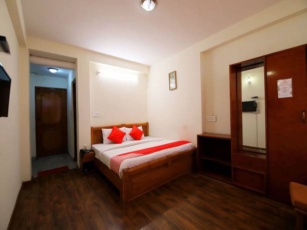 Imagen de la habitación del Hotel OYO 14218 Elixir Cottage. Foto 7