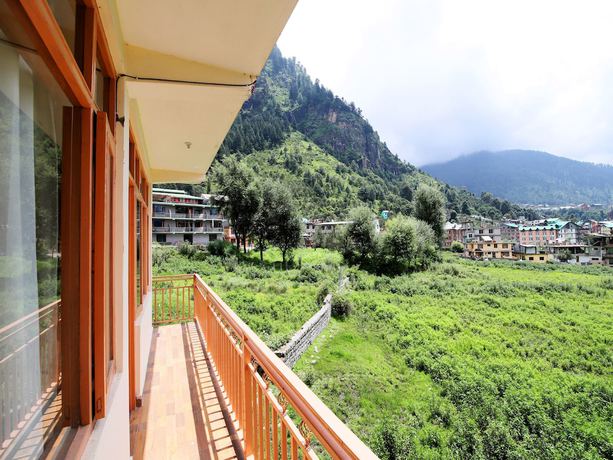 Imagen de la habitación del Hotel OYO 14218 Elixir Cottage. Foto 8