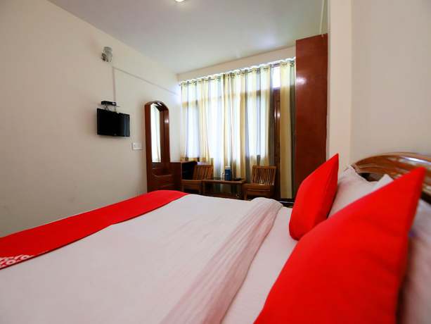 Imagen de la habitación del Hotel OYO 14218 Elixir Cottage. Foto 11