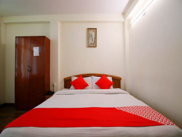 Imagen de la habitación del Hotel OYO 14218 Elixir Cottage. Foto 13