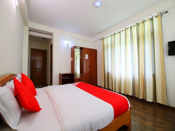 Imagen de la habitación del Hotel OYO 14218 Elixir Cottage. Foto 14