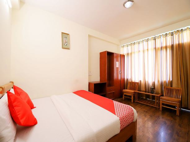 Imagen de la habitación del Hotel OYO 14218 Elixir Cottage. Foto 15