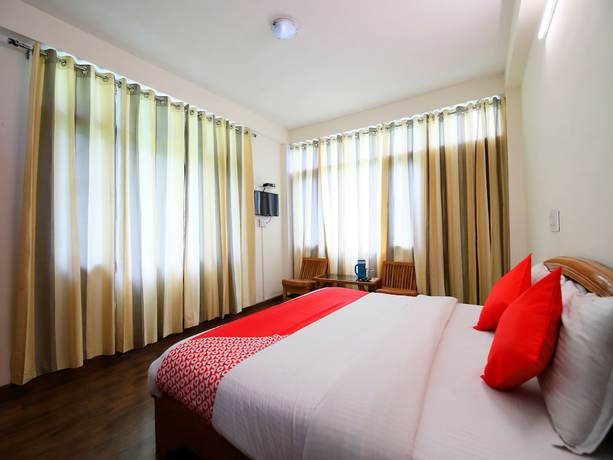 Imagen de la habitación del Hotel OYO 14218 Elixir Cottage. Foto 17