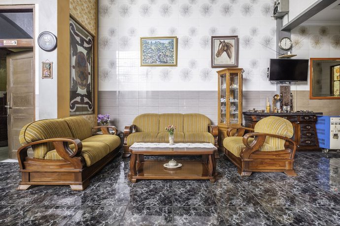 Imagen de los interiores del Hotel OYO 1446 Patradisa. Foto 15