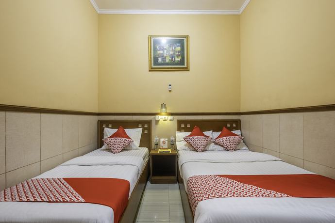 Imagen de la habitación del Hotel OYO 1446 Patradisa. Foto 5