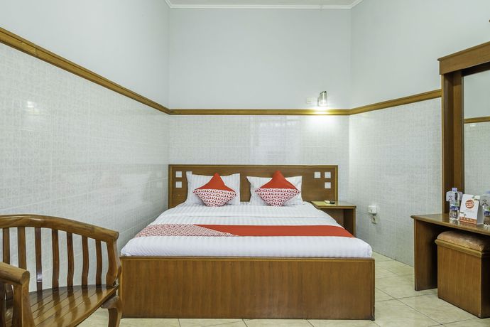 Imagen de la habitación del Hotel OYO 1446 Patradisa. Foto 8