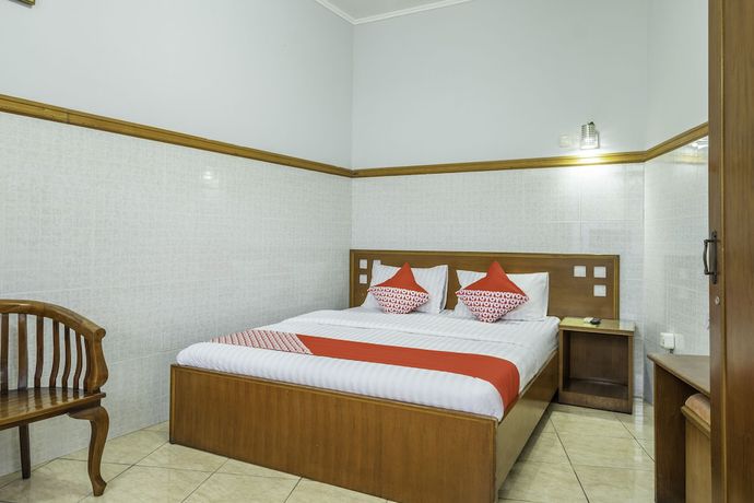 Imagen de la habitación del Hotel OYO 1446 Patradisa. Foto 10
