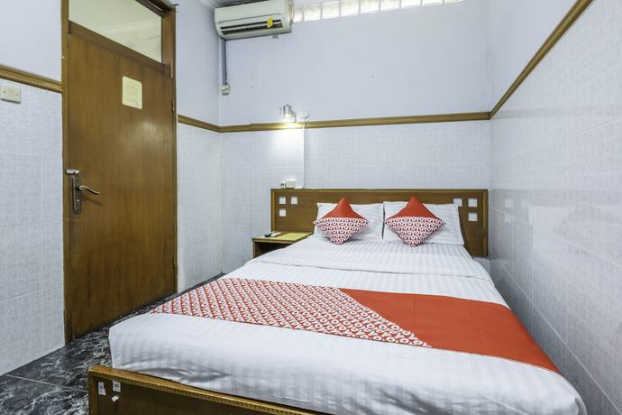 Imagen de la habitación del Hotel OYO 1446 Patradisa. Foto 12