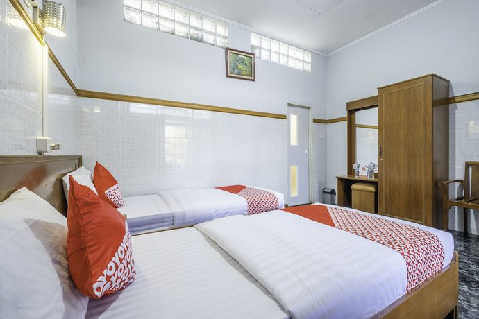 Imagen de la habitación del Hotel OYO 1446 Patradisa. Foto 13
