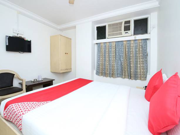 Imagen de la habitación del Hotel OYO 14465 Cozy Residency. Foto 2