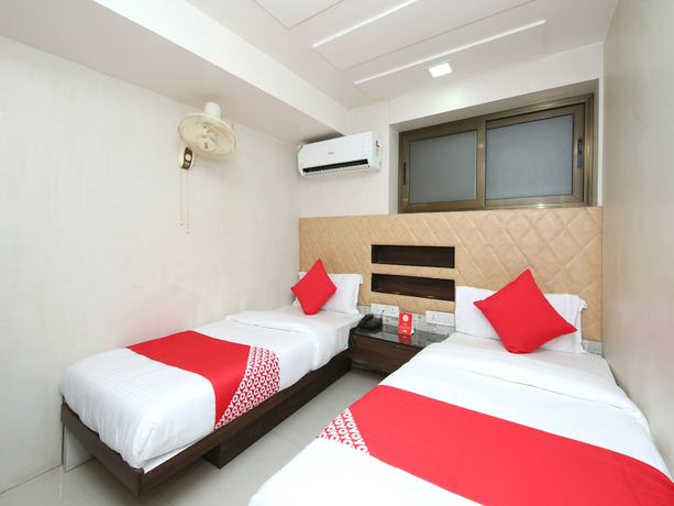 Imagen de la habitación del Hotel OYO 14465 Cozy Residency. Foto 4