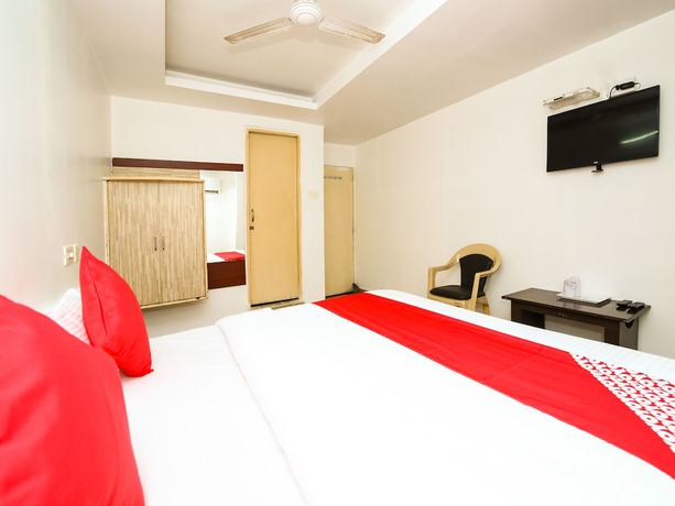 Imagen de la habitación del Hotel OYO 14465 Cozy Residency. Foto 5