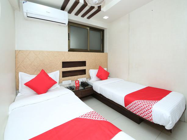 Imagen de la habitación del Hotel OYO 14465 Cozy Residency. Foto 9