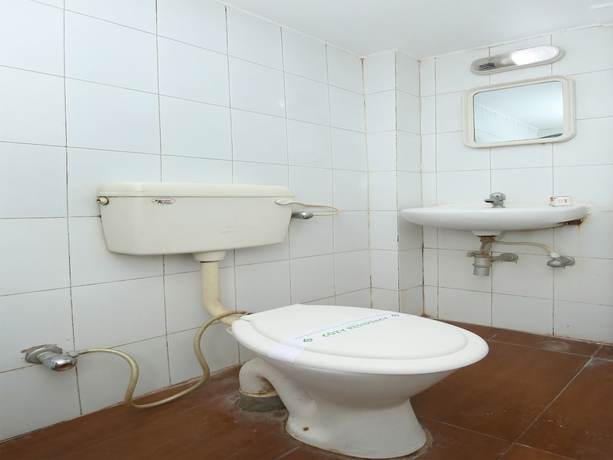 Imagen de la habitación del Hotel OYO 14465 Cozy Residency. Foto 10