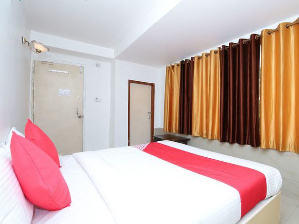 Imagen de la habitación del Hotel OYO 14465 Cozy Residency. Foto 11