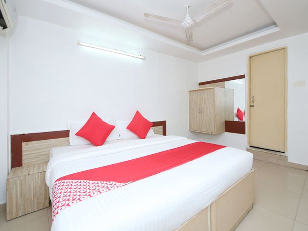 Imagen de la habitación del Hotel OYO 14465 Cozy Residency. Foto 13