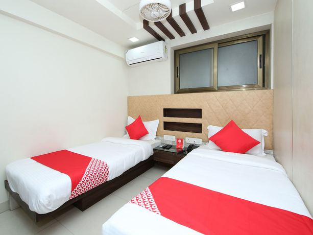 Imagen de la habitación del Hotel OYO 14465 Cozy Residency. Foto 14