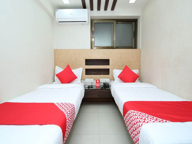 Imagen de la habitación del Hotel OYO 14465 Cozy Residency. Foto 16