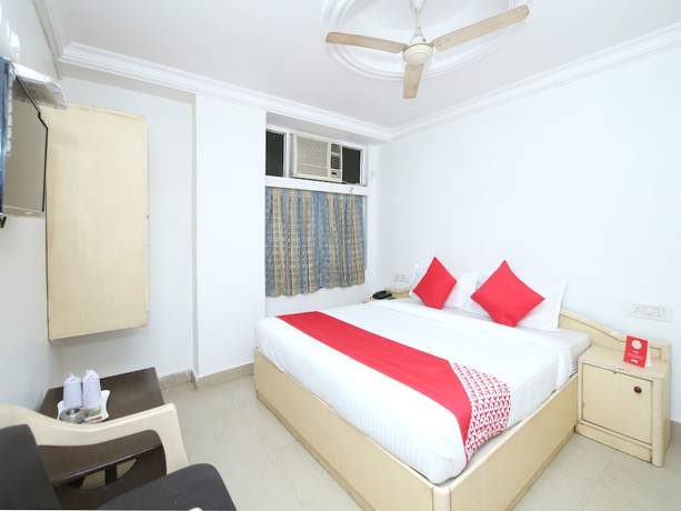Imagen de la habitación del Hotel OYO 14465 Cozy Residency. Foto 17