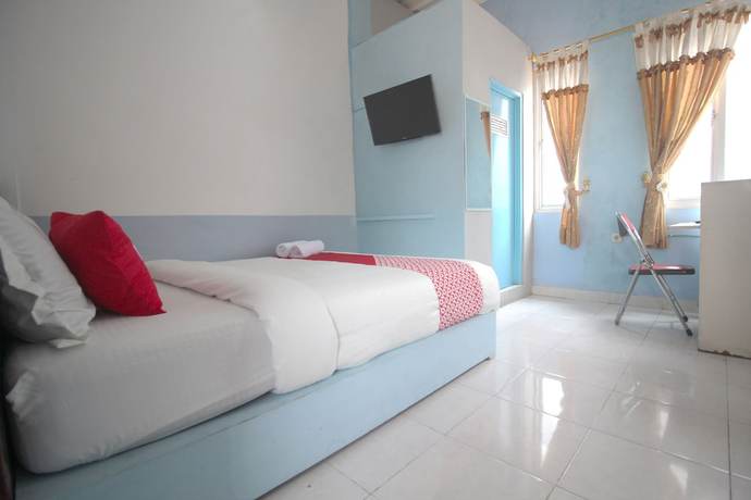 Imagen de la habitación del Hotel OYO 1448 Kartini Residence Syariah. Foto 2