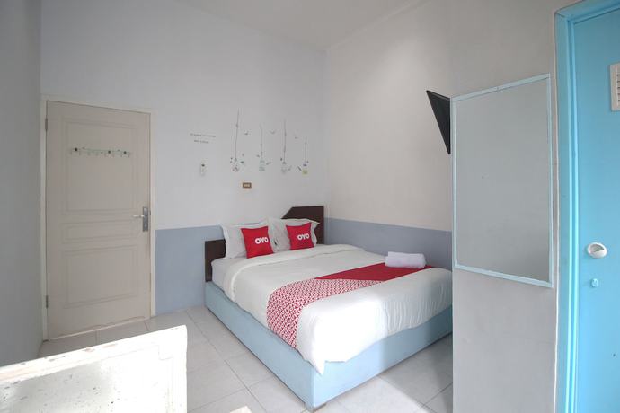 Imagen de la habitación del Hotel OYO 1448 Kartini Residence Syariah. Foto 5