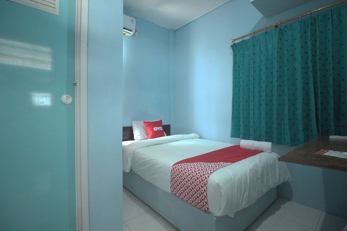 Imagen de la habitación del Hotel OYO 1448 Kartini Residence Syariah. Foto 9