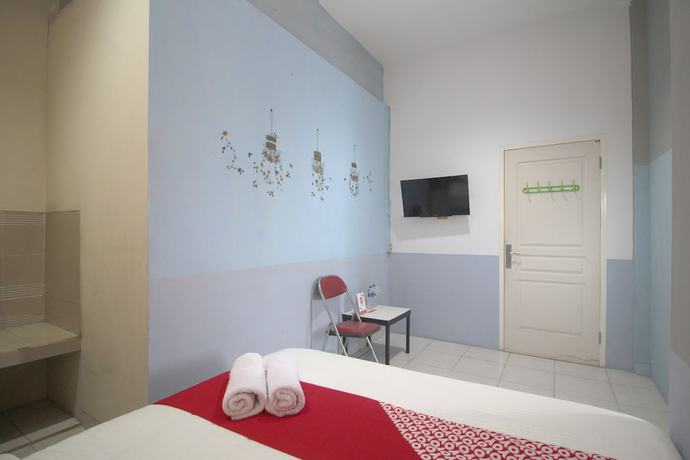 Imagen de la habitación del Hotel OYO 1448 Kartini Residence Syariah. Foto 10