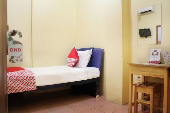 Imagen de la habitación del Hotel OYO 145 Wisma Syariah CMC. Foto 2