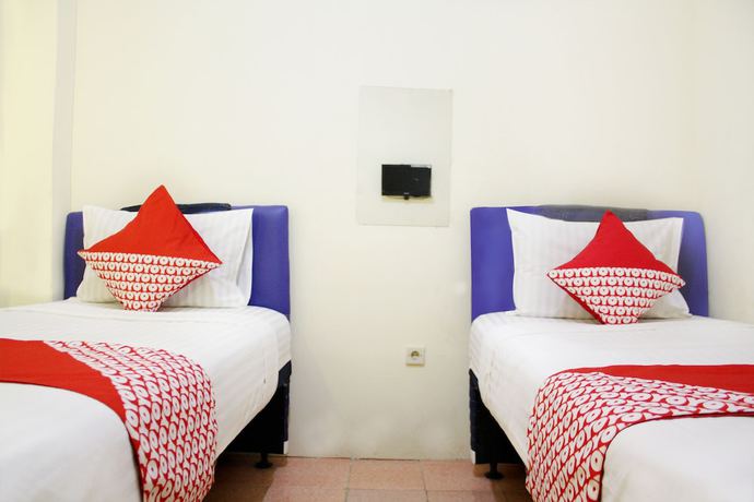 Imagen de la habitación del Hotel OYO 145 Wisma Syariah CMC. Foto 3