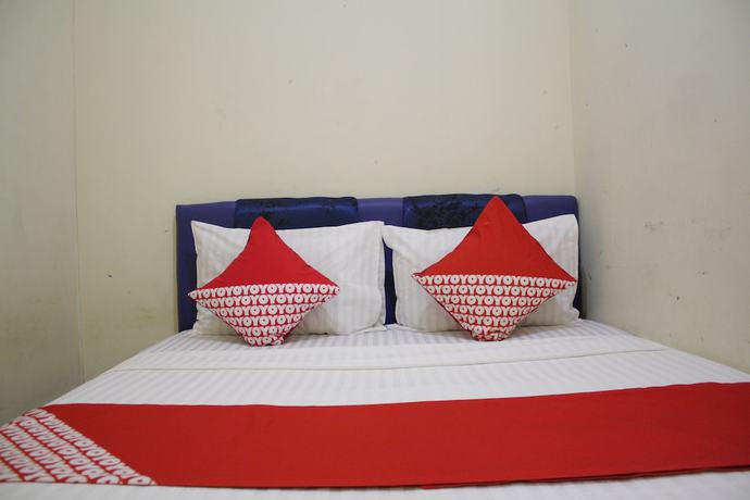Imagen de la habitación del Hotel OYO 145 Wisma Syariah CMC. Foto 4