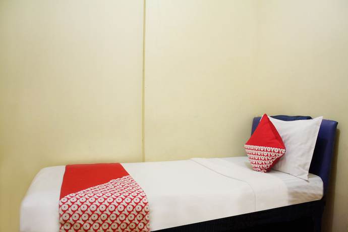 Imagen de la habitación del Hotel OYO 145 Wisma Syariah CMC. Foto 5