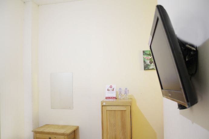 Imagen de la habitación del Hotel OYO 145 Wisma Syariah CMC. Foto 6