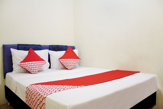 Imagen de la habitación del Hotel OYO 145 Wisma Syariah CMC. Foto 7