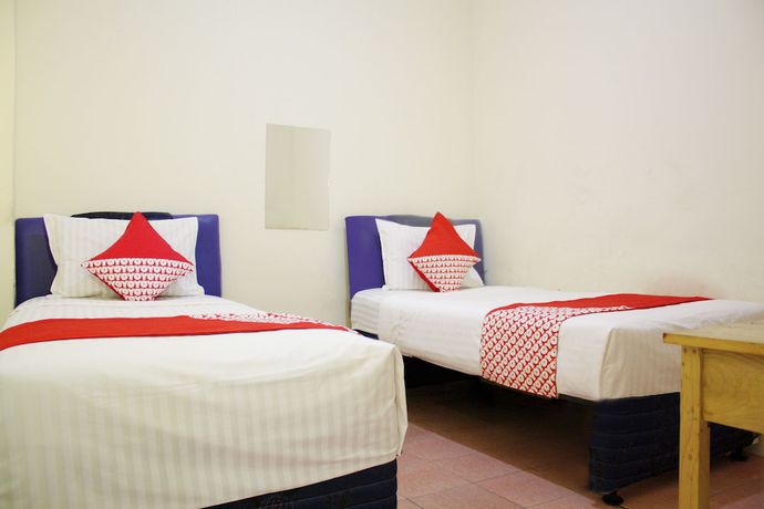Imagen de la habitación del Hotel OYO 145 Wisma Syariah CMC. Foto 8