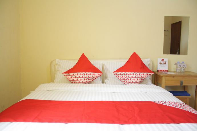 Imagen de la habitación del Hotel OYO 145 Wisma Syariah CMC. Foto 9