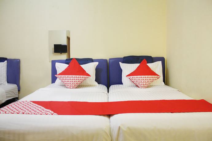 Imagen de la habitación del Hotel OYO 145 Wisma Syariah CMC. Foto 12