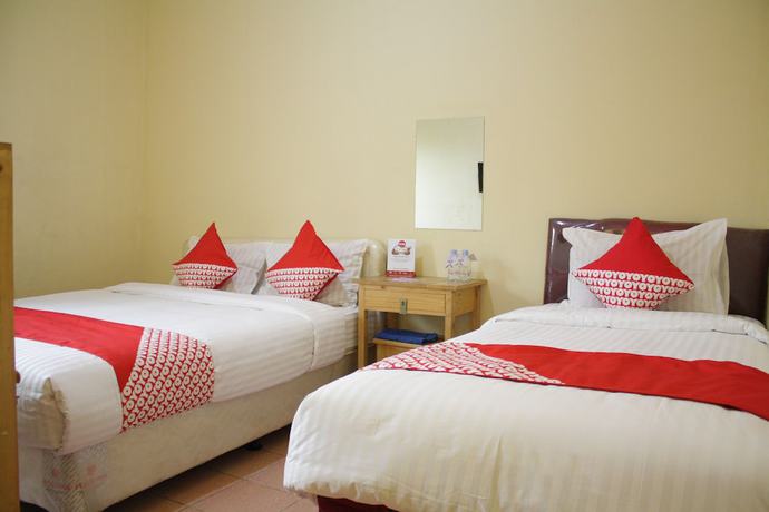 Imagen de la habitación del Hotel OYO 145 Wisma Syariah CMC. Foto 13
