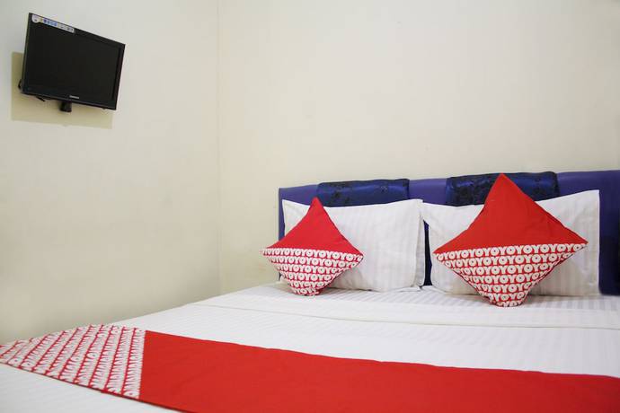 Imagen de la habitación del Hotel OYO 145 Wisma Syariah CMC. Foto 14