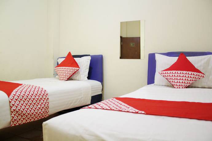 Imagen de la habitación del Hotel OYO 145 Wisma Syariah CMC. Foto 15