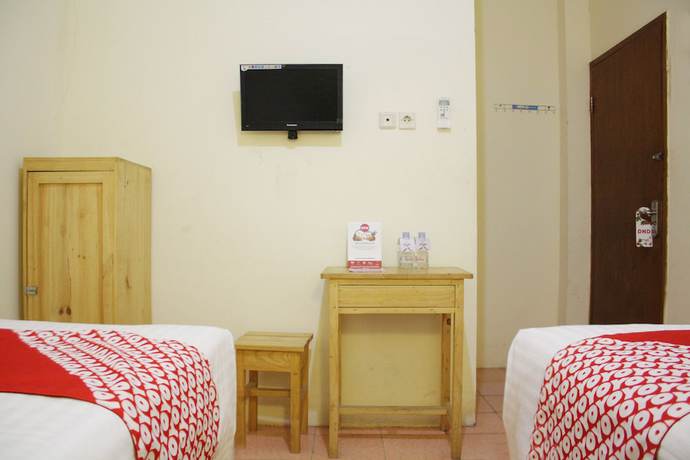 Imagen de la habitación del Hotel OYO 145 Wisma Syariah CMC. Foto 17