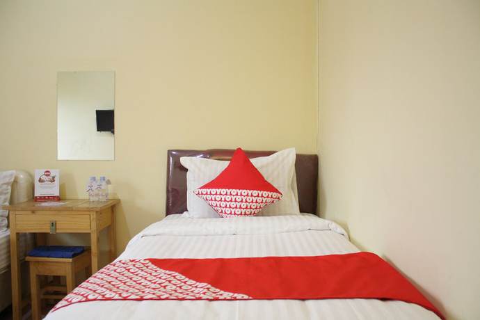 Imagen de la habitación del Hotel OYO 145 Wisma Syariah CMC. Foto 18