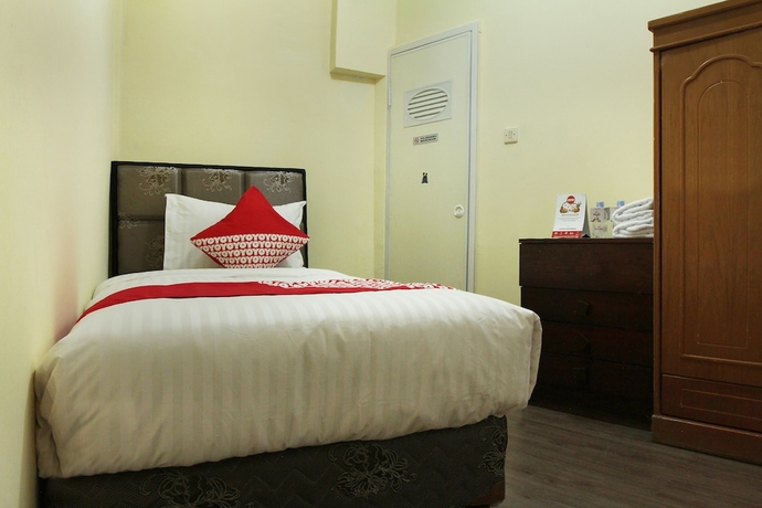 Imagen de la habitación del Hotel OYO 146 Menteng Residence. Foto 8