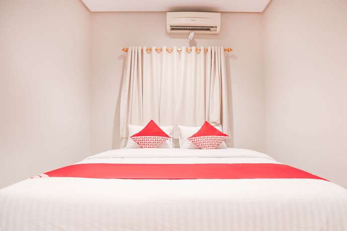 Imagen de la habitación del Hotel OYO 148 Cempaka Place Homestay. Foto 3