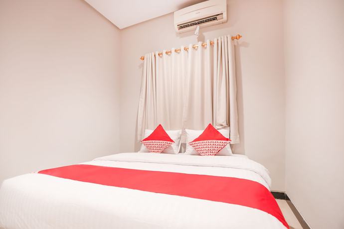 Imagen de la habitación del Hotel OYO 148 Cempaka Place Homestay. Foto 4