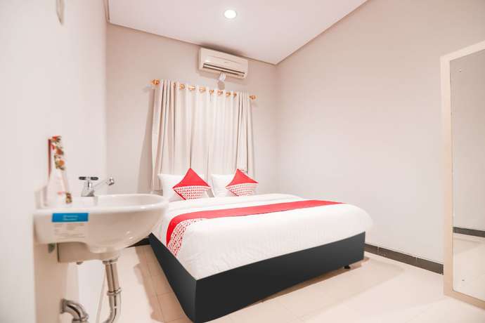 Imagen de la habitación del Hotel OYO 148 Cempaka Place Homestay. Foto 6