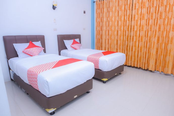 Imagen de la habitación del Hotel OYO 1498 Pak Har Bungalow. Foto 2