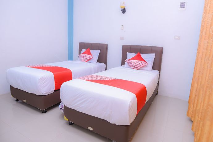 Imagen de la habitación del Hotel OYO 1498 Pak Har Bungalow. Foto 5