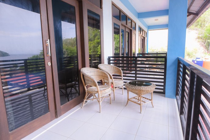 Imagen de los interiores del Hotel OYO 1498 Pak Har Bungalow. Foto 20
